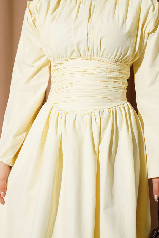 Robe évasée jaune à la taille marquée Gipeli