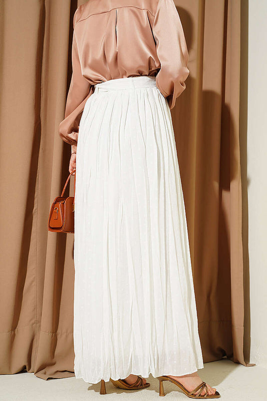Jupe plissée à pois avec ceinture beige clair