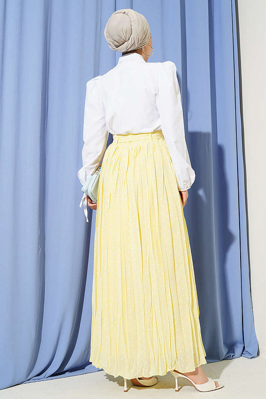 Jupe plissée à pois avec ceinture beige