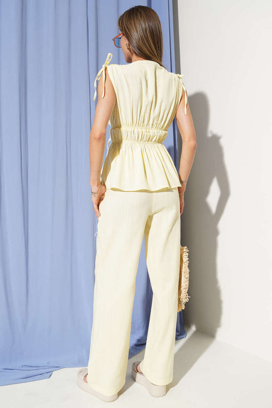 Two-piece set with blouse and elasticated waist detail, yellow.