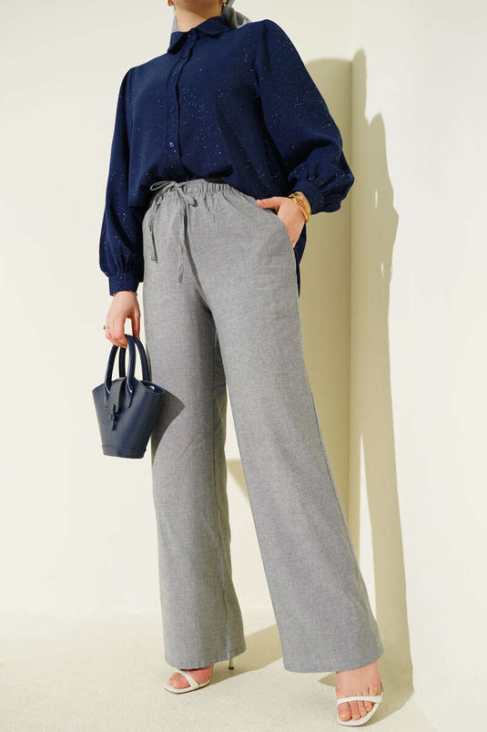 Pantalon large gris à taille élastique et cordon de serrage