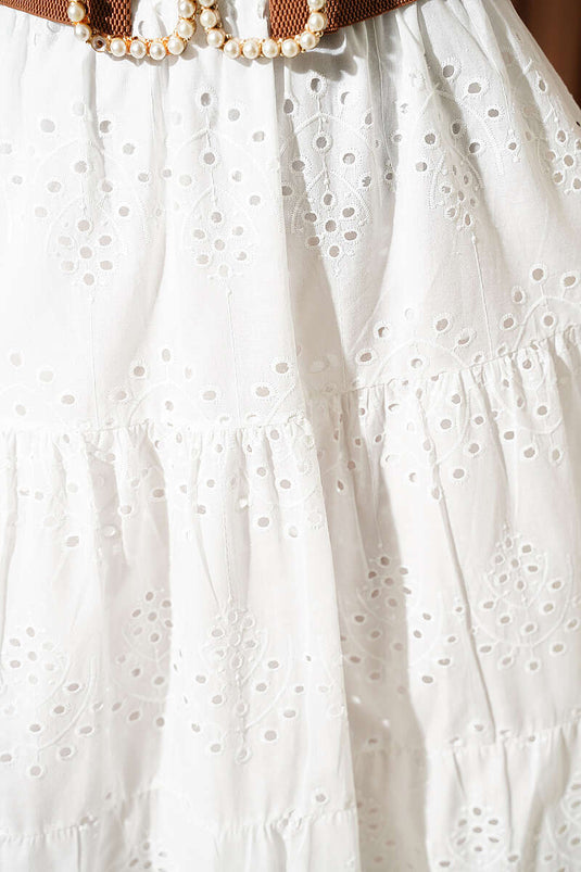 Jupe évasée à volants superposés en broderie avec ceinture élastique blanche