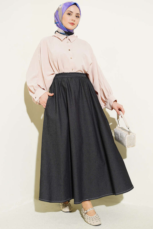 Jupe en jean noire avec ceinture élastique et poches détaillées