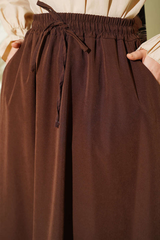 Rok van tensel met elastische taille en zakken, bruin