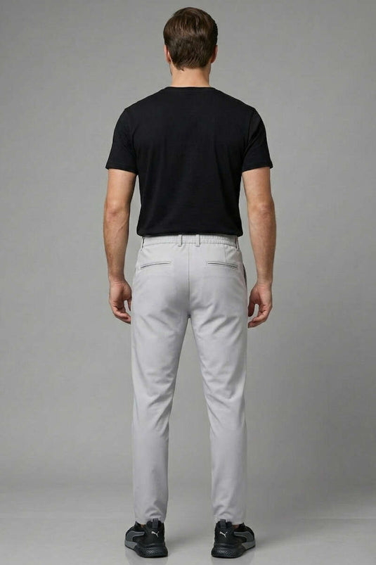 Pantalon homme gris slim à bas resserré avec ceinture élastique