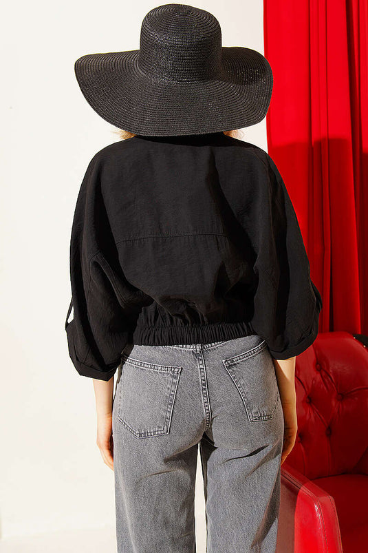 Chemise courte à manches raglan élastiquées noire