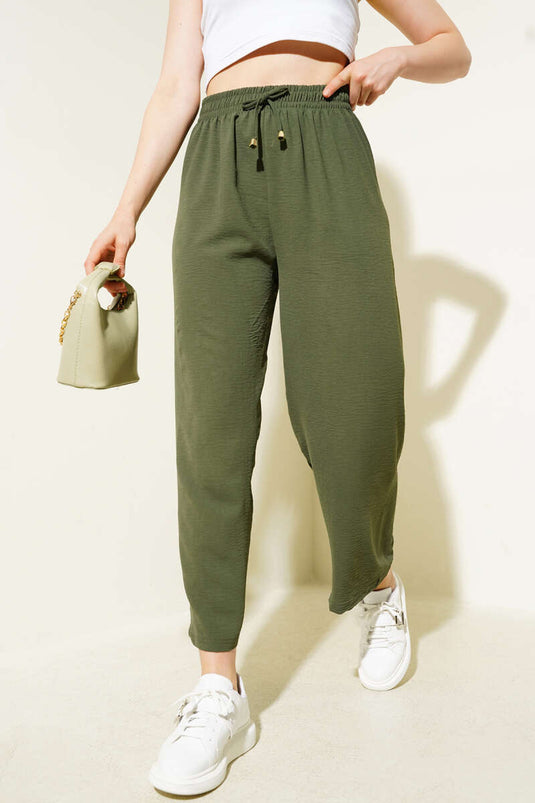 Pantalones Ayrobin de pierna ancha y cintura elástica color caqui