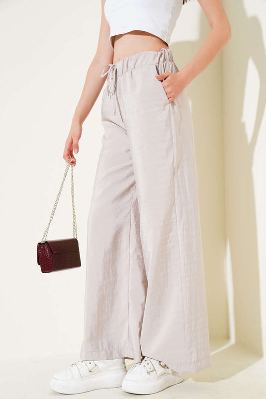 Bel Lastikli Geniş Paça Parlak Pantolon Bej