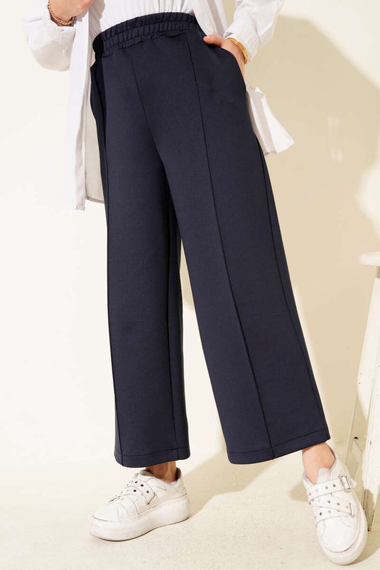 Pantalon de plongée à jambes larges avec taille élastique, bleu marine.