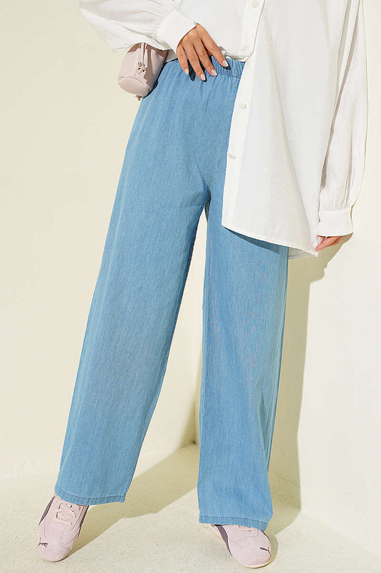 Blauer Hochtaillierter Elastischer Jeanshose Mit Weiten Beinen