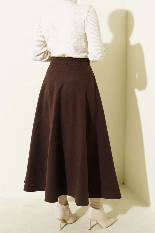 Brauner, ausgestellter Kaschmirrock mit elastischem Bund