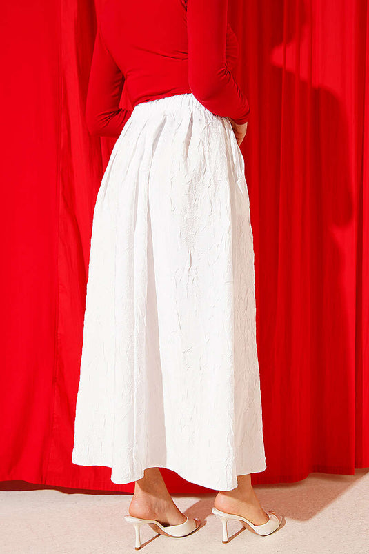 Jupe blanche avec poches en crêpe et taille élastique