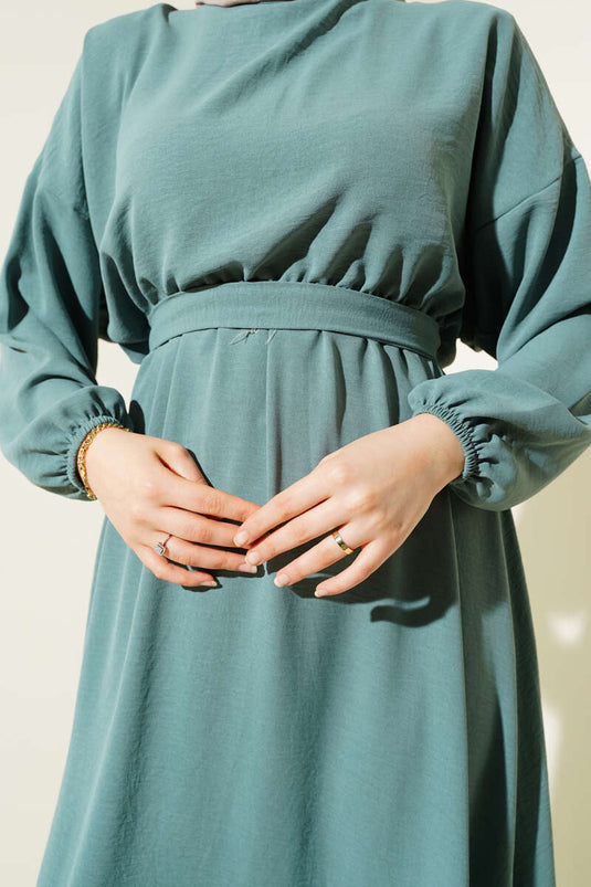 فستان أيروبين بحزام خصر مطاطي باللون الأخضر اللوزي