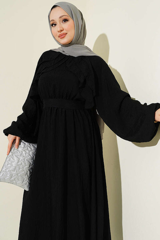 Robe noire à volants avec ceinture élastique