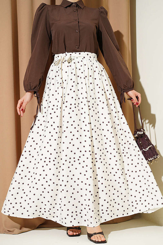 Jupe à pois écrue avec ceinture élastique