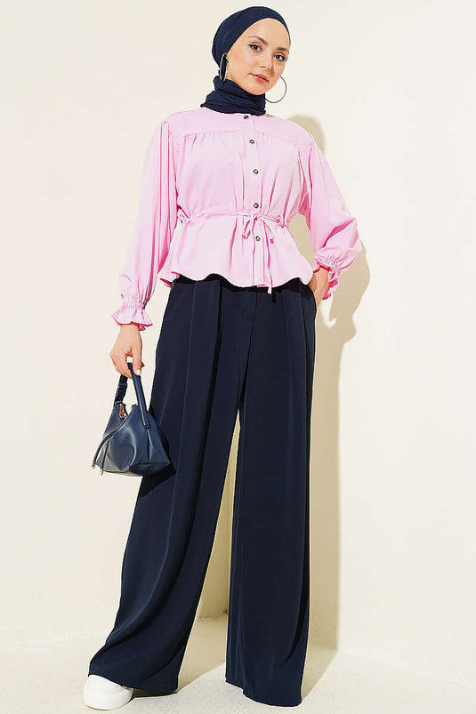 Chemisier court rose avec ceinture à tunnel et poignets élastiqués