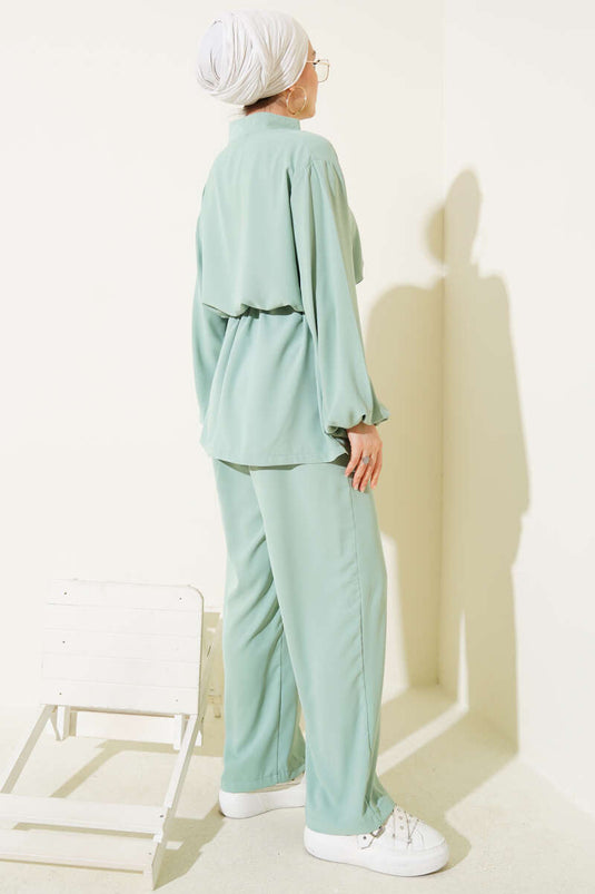 Combinaison deux pièces à rabat et poche zippée, taille tunnel, vert aqua