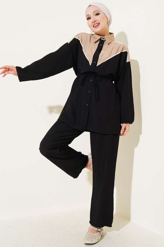 طقم من قطعتين مع نفق للخصر وحافة على شكل حرف V، أسود