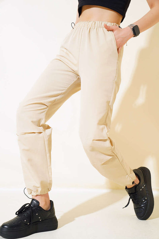 Pantalon parachute avec taille et jambes élastiques Beige