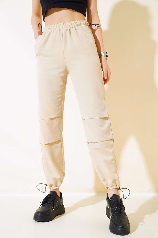 Pantalon parachute avec taille et jambes élastiques Beige