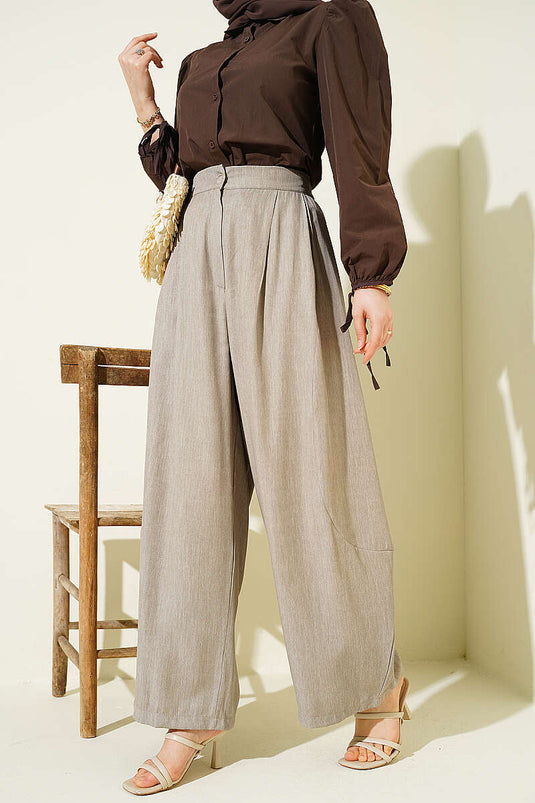 Pantalon sarouel plissé à boutons beige