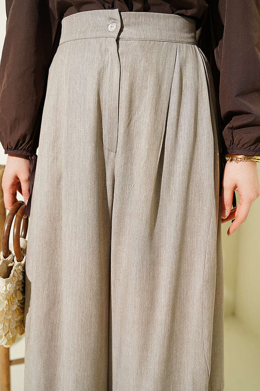 Pantalon sarouel plissé à boutons beige