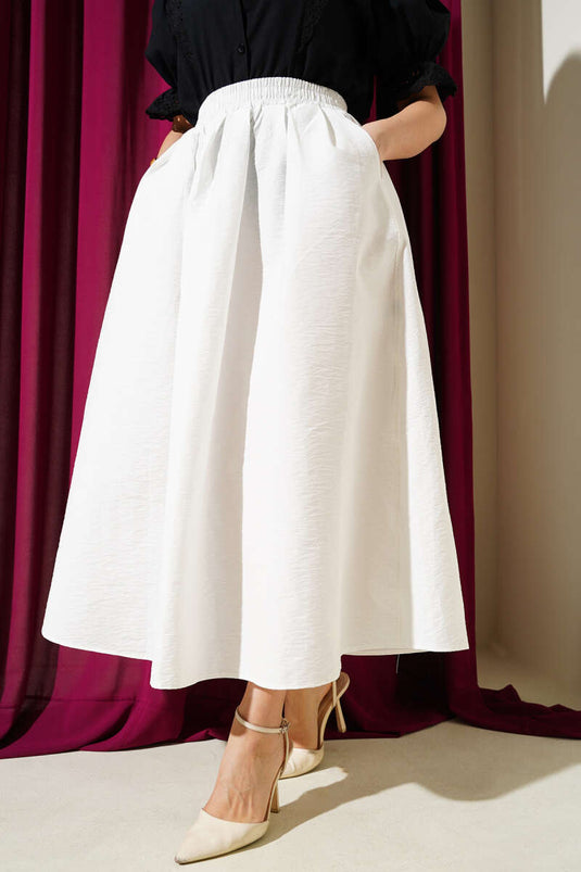 Jupe évasée blanche avec poches et ceinture élastique Beli