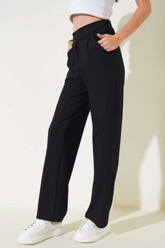 بنطلون أسود بخصر مطاطي وجيب