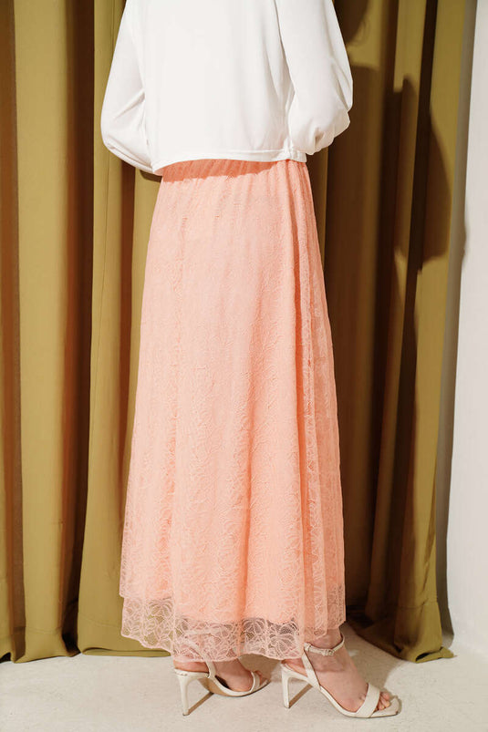 Gonna elastica con pizzo floreale color salmone