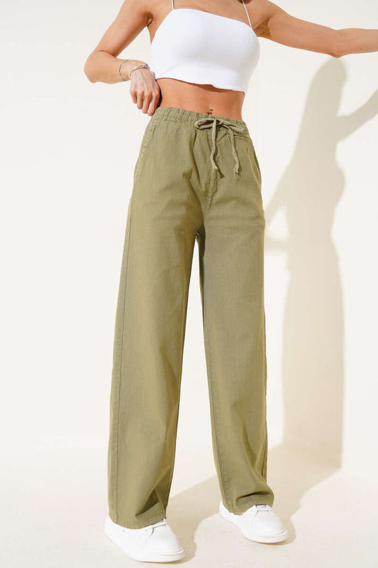 بنطلون كتان واسع الساق بخصر مطاطي، لون كاكي