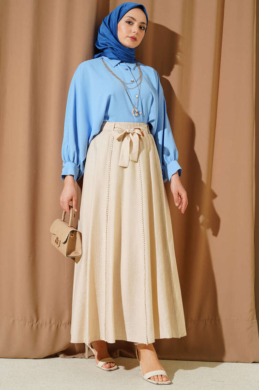 Jupe évasée beige avec ceinture élastique