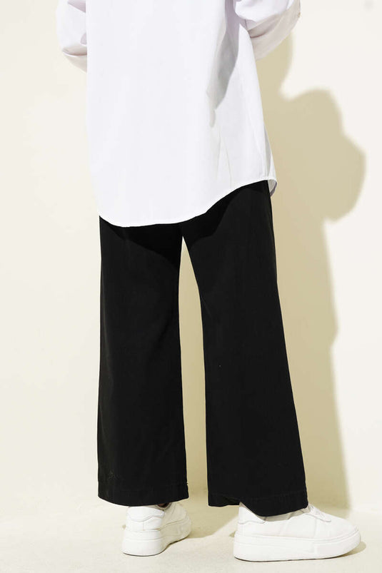 Jean noir à taille élastique