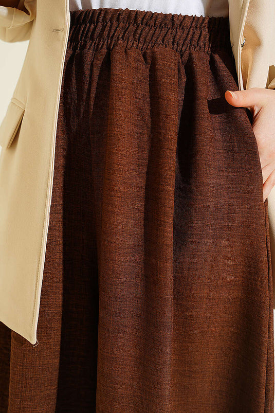 Pantaloni oversize con elastico e fondo ampio color caffè