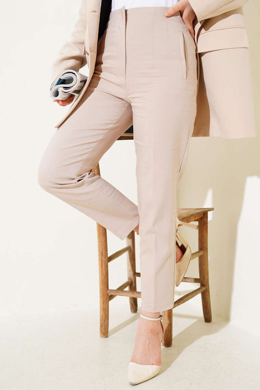 Pantalon skinny en tissu à taille pincée beige