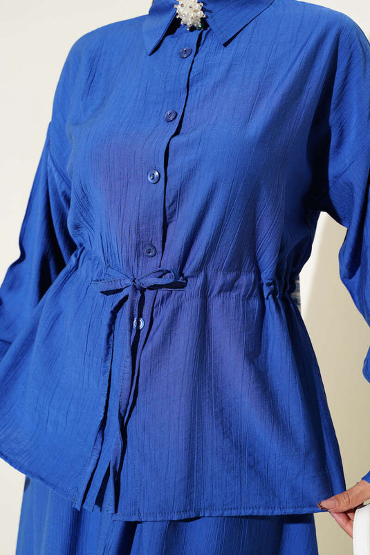 Costume deux pièces à jupe taille tunnel chez Saks