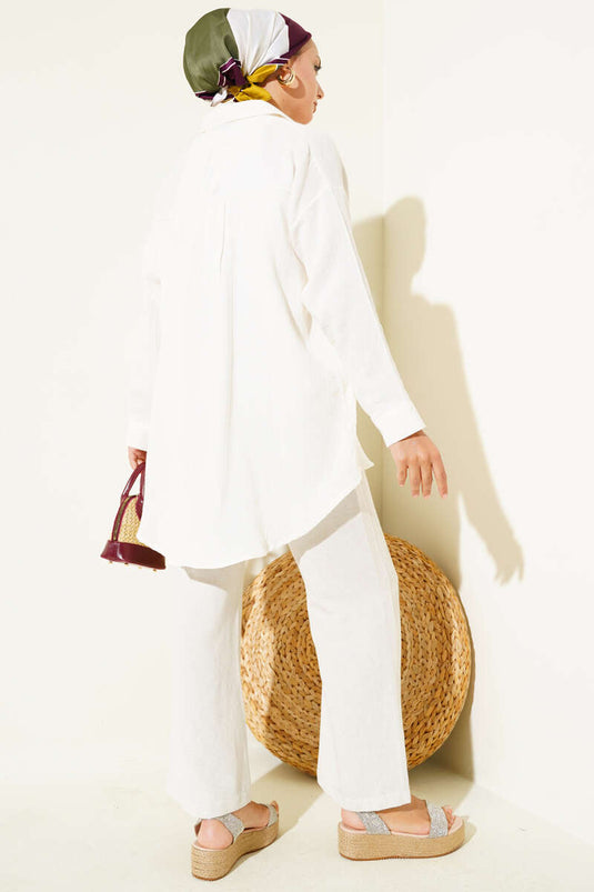 قميص أساسي بأزرار عند الكاحل باللون البيج