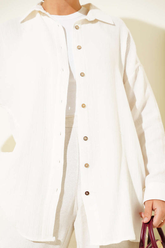 قميص أساسي بأزرار عند الكاحل باللون البيج