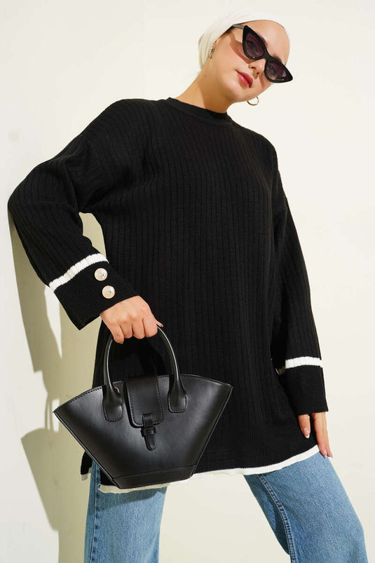 سترة محبوكة مضلعة بأزرار على الأكمام، سوداء