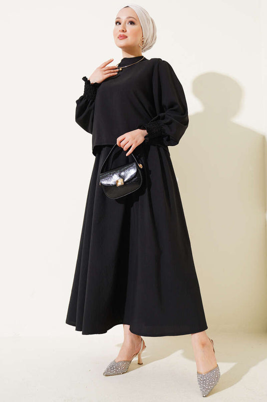 طقم من قطعتين مع تنورة بطول الكاحل وأسود