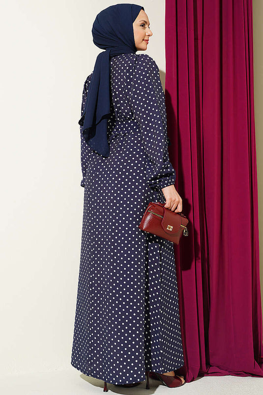 Robe à pois avec ceinture élastique aux poignets bleu marine