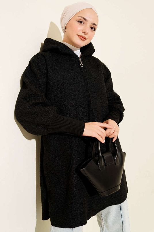 Cardigan bouclé con cappuccio a costine alla caviglia, nero