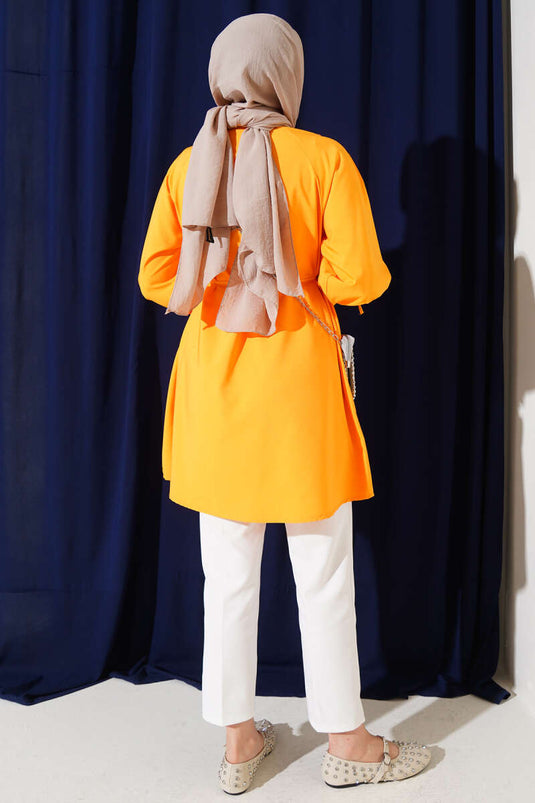 قميص بريطاني بأزرار عند الكاحل باللون البرتقالي