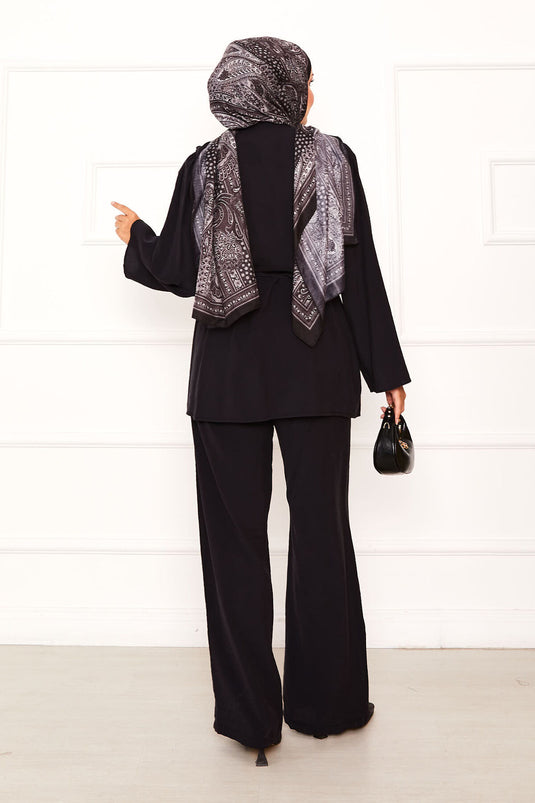 Costume deux pièces Brit noir boutonné avec ceinture amovible