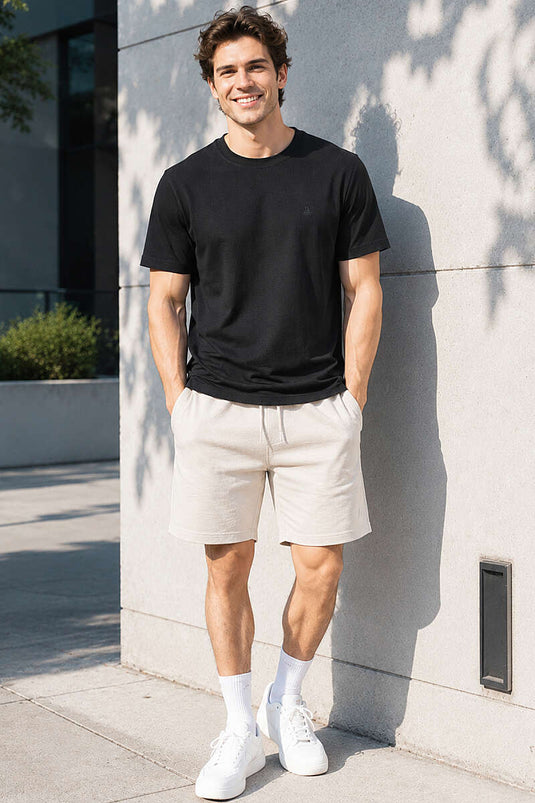 Rundhalsausschnitt Herren T-Shirt mit Brustemblem Schwarz