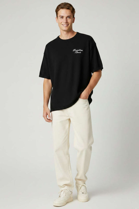 T-shirt en maille brodée à col rond noir