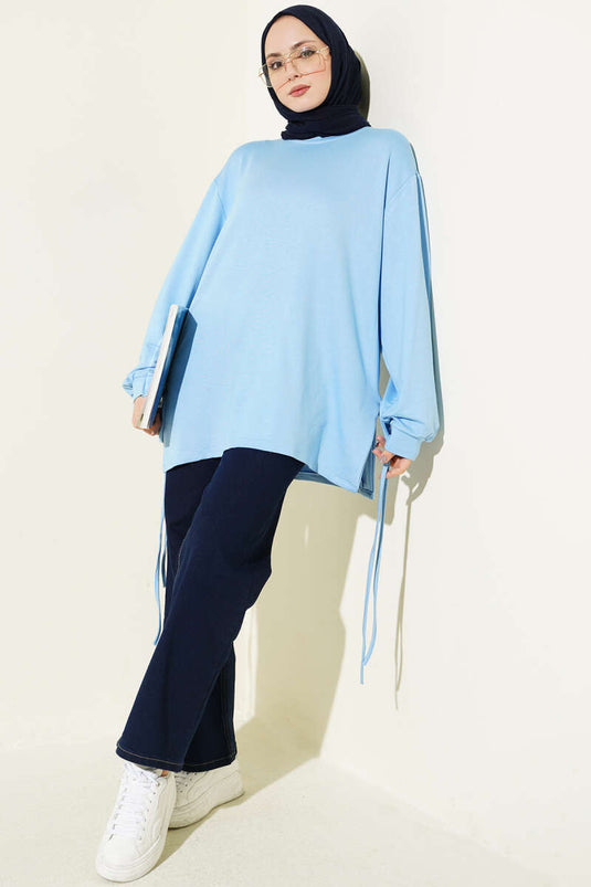 تونيك بياقة دائرية وأربطة جانبية باللون الأزرق الفاتح