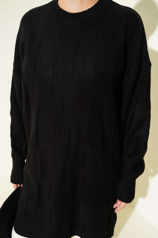 Tunique noire en maille douce à col rond et fente latérale