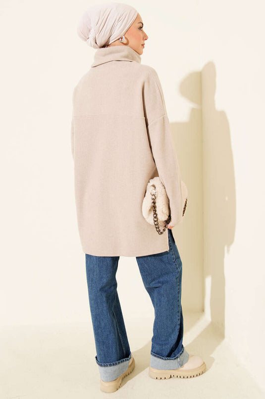 Tunique en velours côtelé beige à col roulé