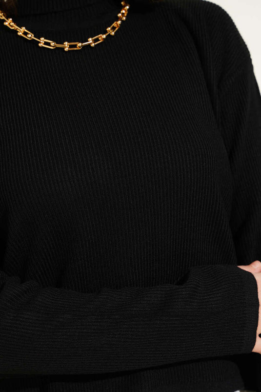 Pull en maille ample à col roulé noir