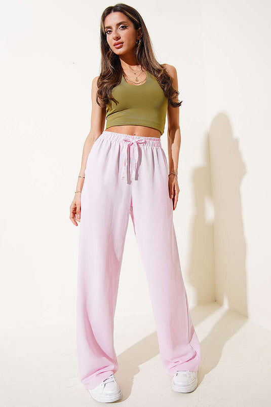 Pantalon en lin rose à taille élastique et jambes larges